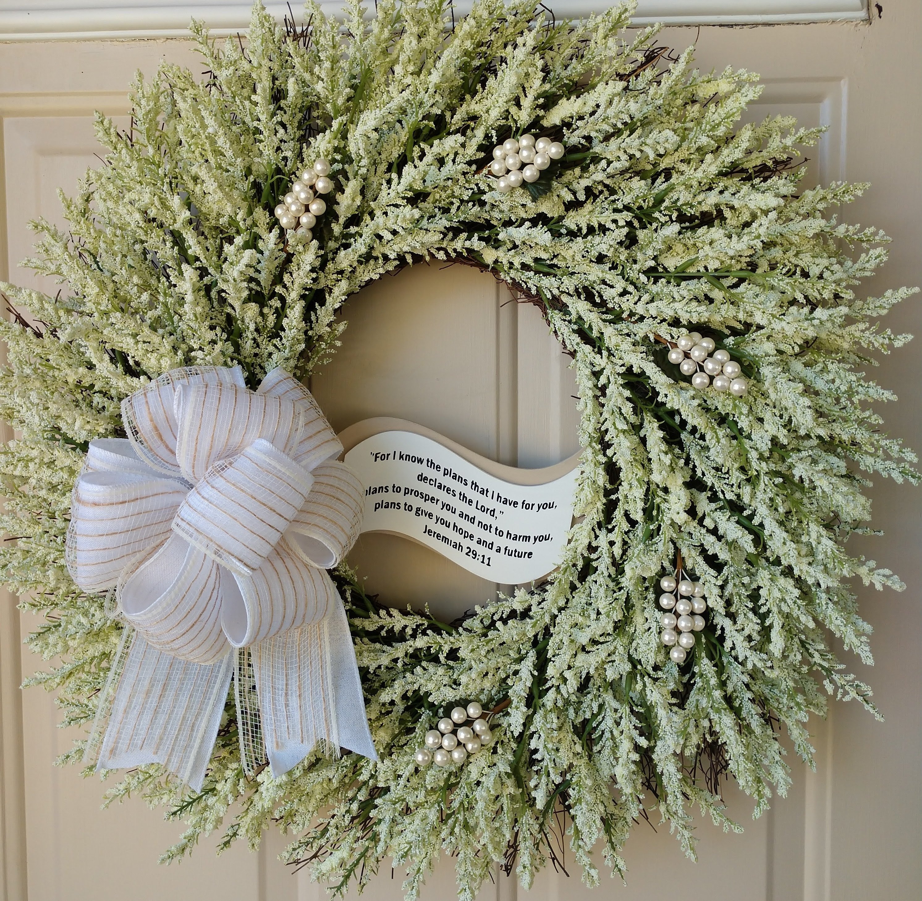 White Heather Wreath Accented with White Pearls and Butterflies Infused with Bible scripture.